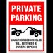 Private parking unauthorized vehicles will be towed at owner's expense